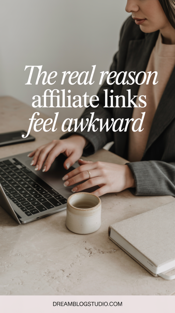 Blogger typing on laptop with text ‘The real reason affiliate links feel awkward’ — affiliate marketing tips for bloggers